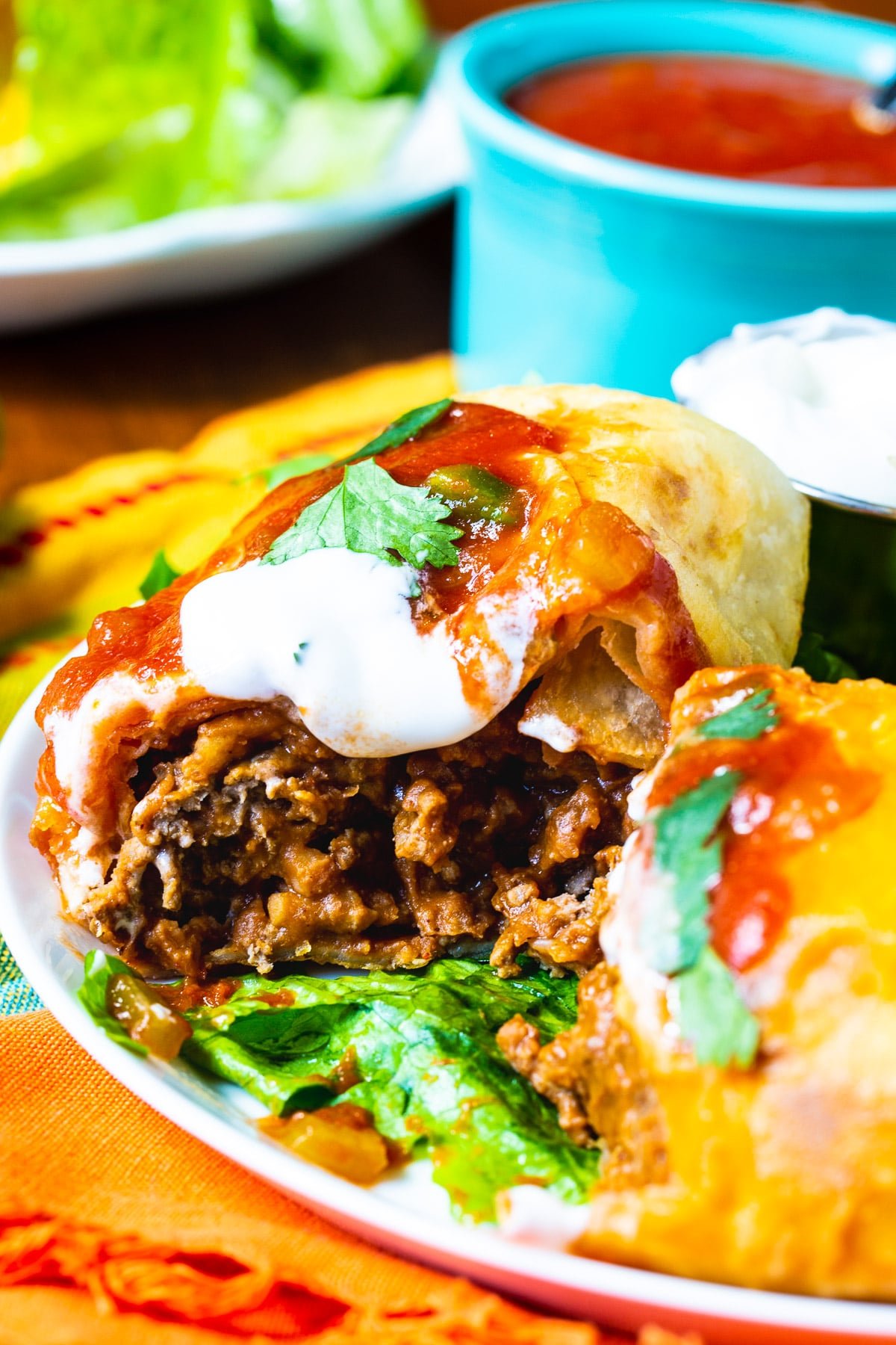 Queso-Smothered Beef Chimichangas