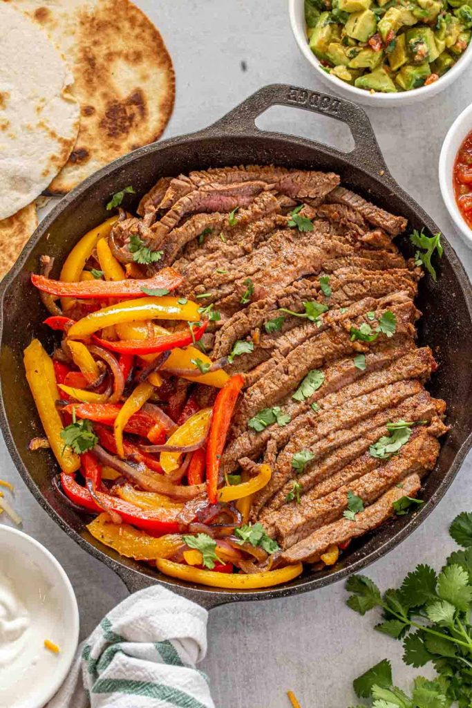 Sizzling Steak Fajitas With Sauteed Onions And Bell Peppers