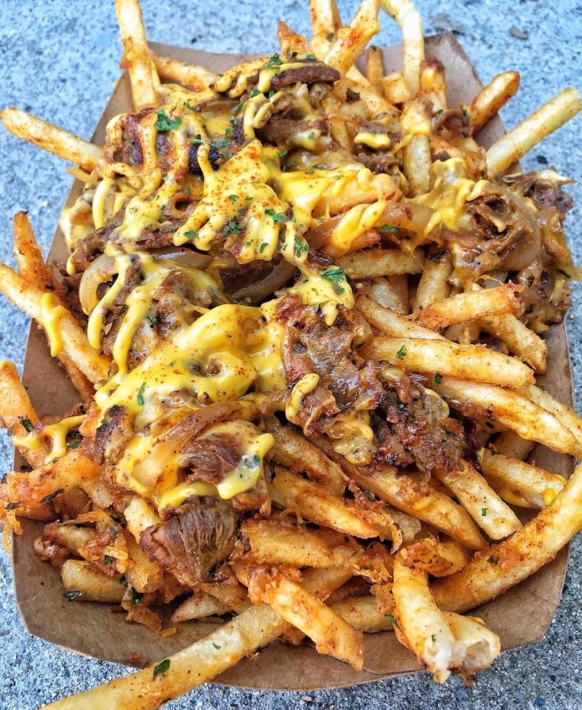 Steak Fries With Cheese Sauce And Toppings
