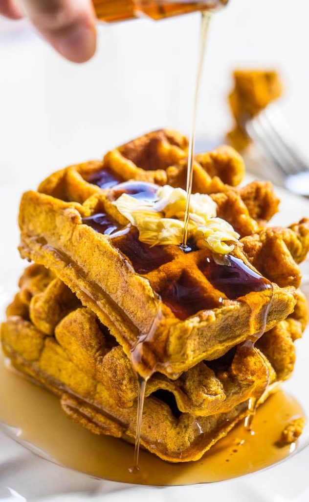 Pumpkin Waffles With Maple Syrup And Pumpkin Seeds